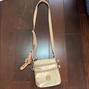 Kipling cross body gold purse
